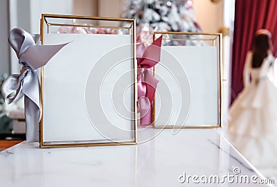 Beautiful frames and other Christmas details in decorated room Stock Photo