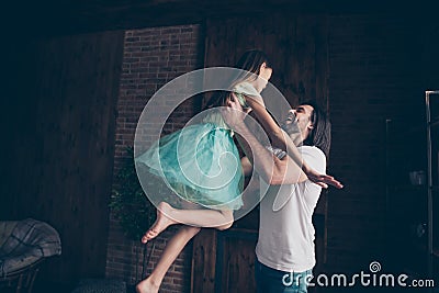 Photo of beautiful little adorable lady and her handsome young daddy swing little princess raise up air spend weekend Stock Photo