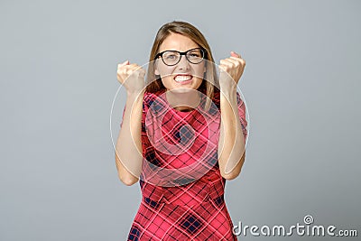 Photo of beautiful wild lady. Hands raised forward with fists Stock Photo