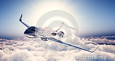 Photo of black luxury generic design private jet flying in blue sky. Huge white clouds and sun at background. Business Stock Photo