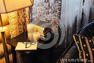 Cozy place for reading in log cabin Stock Photo