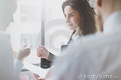 Photo business partners meeting. Team succes. Businesswoman giving businesS card colleague. Blurred background, film Stock Photo