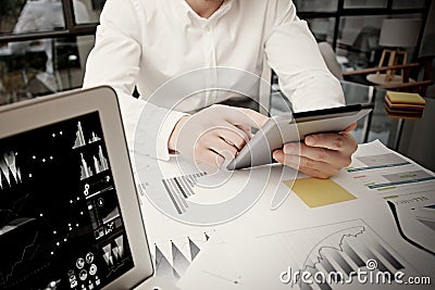 Photo businessman touching modern tablet screen.Trader manager working new private banking project office.Using Stock Photo