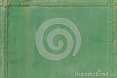 Green faded metal wall with metal stripes on the edges. Metal frame. Stock Photo