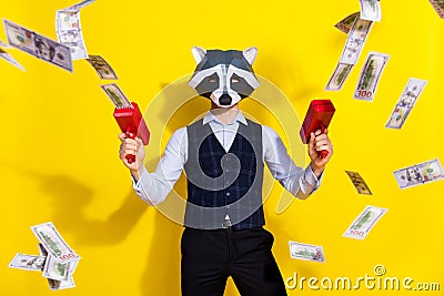 Photo of charismatic character guy racoon mask shoot earnings money pistol stylish look isolated over shine yellow color Stock Photo