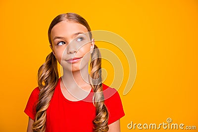 Photo of charming funny small lady interested looking empty space thinking over creative picture idea wear casual red t Stock Photo