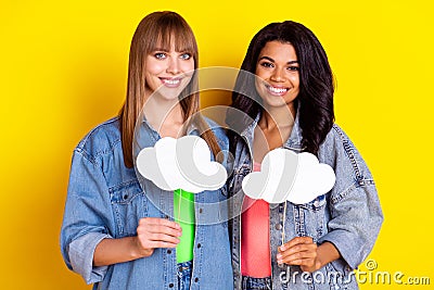 Photo of charming positive girls dark skin hand hold cloud empty space figure isolated on yellow color background Stock Photo