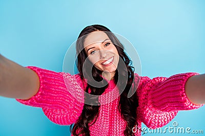 Photo of charming pretty happy woman hold camera make selfie blog isolated on pastel blue color background Stock Photo