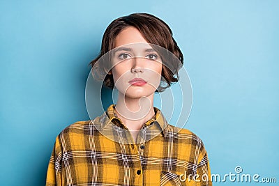 Photo of charming serious lovely bob hairdo woman look camera wear plaid shirt isolated blue color background Stock Photo