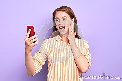 Cute girl received message from boy that she likes, feels excited and joyful Stock Photo