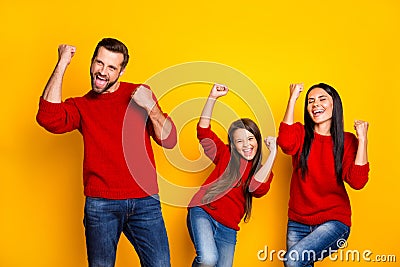 Photo of cheerful cute nice family look overjoyed wearing jeans denim red sweaters admiring adoring shouting brunette Stock Photo