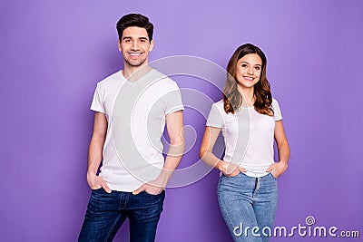Photo cheerful pretty lady handsome macho guy couple good mood best friends easy-going people hands pockets wear casual Stock Photo