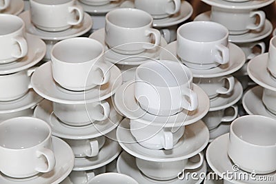 Photo closely standing diagonal rows together white porcelain mugs Stock Photo