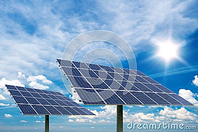 Photo collage of solar panels against blue sky background Stock Photo