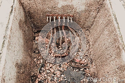 Photo of a concrete electricity and lightning grounding pit. Stock Photo