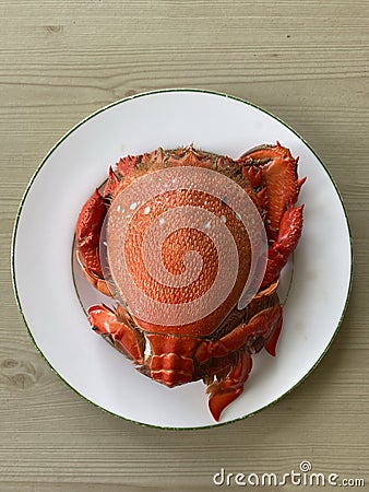 Photo of cooked curacha spanner crab or red frog crab on plate Philippine seafood Stock Photo