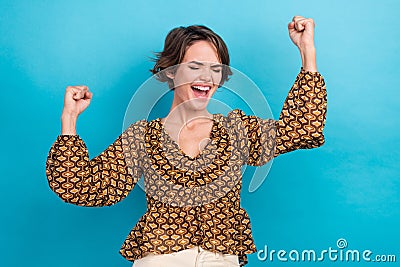 Photo crazy scream girl young wear vintage stylish blouse raised fists up active celebrate promotion job isolated on Stock Photo