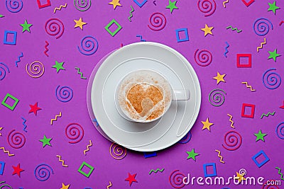 Photo of cup of coffee on the wonderful purple background in pop Stock Photo