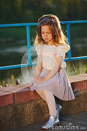 Cute little crying girl with tiara Stock Photo