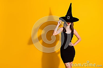 Photo of cute pretty young lady hands hold cap evil scorn unpredictable character empty space fall theme event wear Stock Photo
