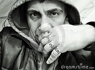 photo depicting a man with sweatshirt and hood. Stock Photo