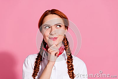 Photo of dreamy minded girl wear white stylish clothes arm touch face hmm look empty space isolated on pink color Stock Photo