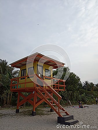 Photo Editorial, 20 Januari 2021, North Jakarta, Indonesia life Guard Tower, with local tourist Editorial Stock Photo