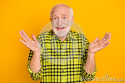 Photo of elderly man happy positive smile gesture hands questioned no answer isolated over yellow color background Stock Photo