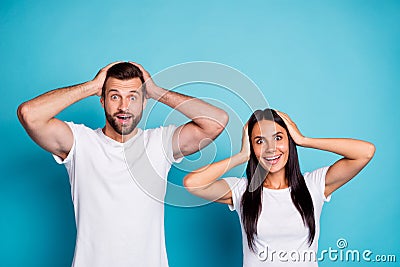 Photo of excited pair not believe successful happening wear casual outfit isolated blue background Stock Photo