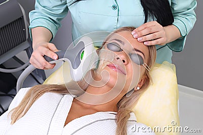 Photo Facial Therapy. Anti-aging Procedures. Stock Photo