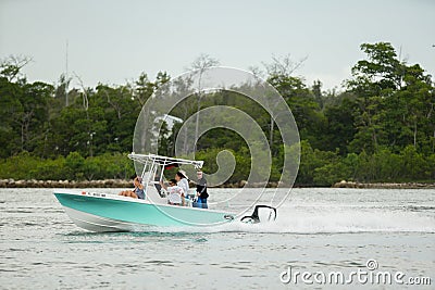 Photo of a family boating in Miami on the weekend. Shot with a telephoto lens for nice bokeh Editorial Stock Photo