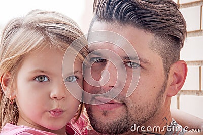 Photo of father and daughter close-up. Stock Photo