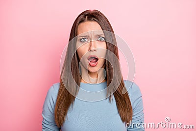 Photo of fearful mad grimacing girl afraid of news she heard emotional isolated over pastel color background Stock Photo