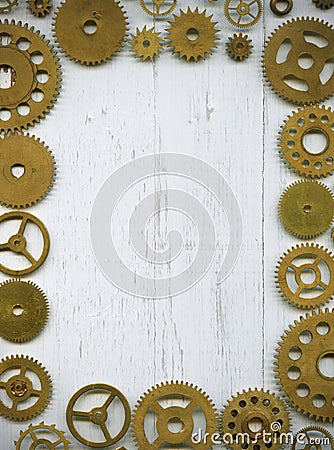 Photo frame, from a large number of watch gears on a wh Stock Photo