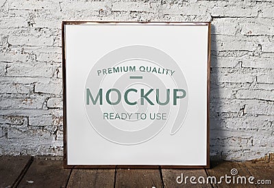 Photo frame mockup by the brick wall Stock Photo