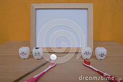 Photo Frame and Model toys teeth in dentistry Stock Photo