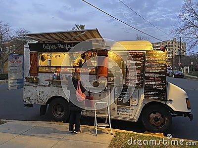 French Food Truck in the Neighborhood Editorial Stock Photo