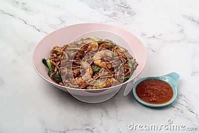 Freshly cooked Indonesion food called Shrimp Mie Goreng Stock Photo