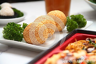 Freshly made Chinese dessert food called Buchi or Sesame balls with sweet filling Stock Photo