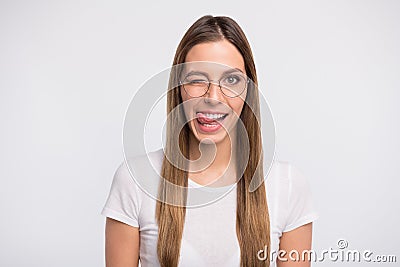 Photo of funky lady tempting lick lips and blink eye wear specs and t-shirt isolated white background Stock Photo