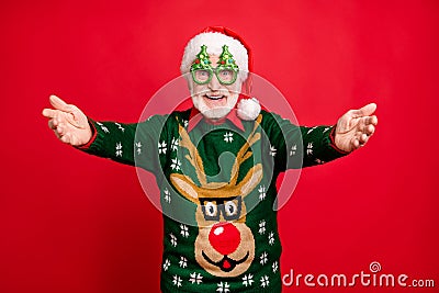 Photo of funny grey haired santa glad children coming to newyear party want many hugs wear x-mas tree shape specs ugly Stock Photo