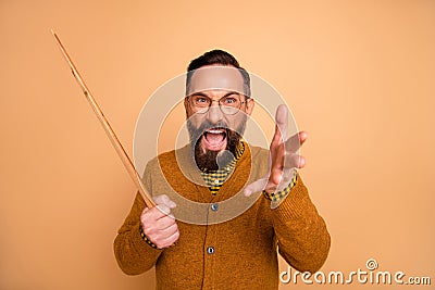 Photo of furious mature man teacher scream school problem hold pointer isolated over beige color background Stock Photo