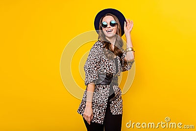 Photo of glamour happy charming lady look empty space wear sunglass isolated on yellow color background Stock Photo