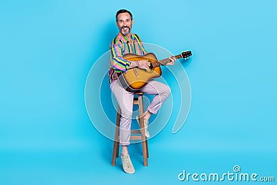 Photo of glamour talented vocalist sitting stool hobby time give concert enjoy cool time occasion on blue color Stock Photo