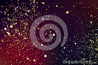 Photo of golden glitter on a black background. Golden explosion Stock Photo