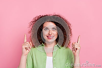 Photo of good mood woman with perming coiffure dressed stylish shirt look directing at sale empty space isolated on pink Stock Photo