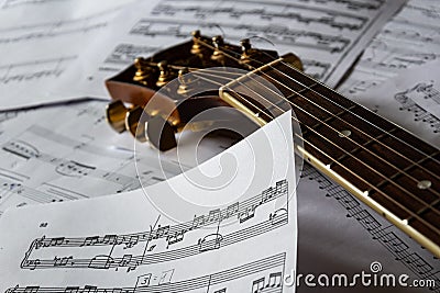 Guitar neck, strings and notes. Music and guitar, musical notation. Stock Photo