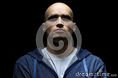 Photo of hairless man with uplifted chin Stock Photo