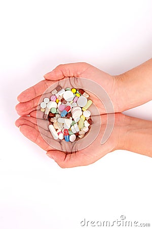 Photo handful of hands full of pills and capsules Stock Photo