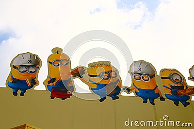 Photo of `HAPPY MINION` Wall Art Editorial Stock Photo